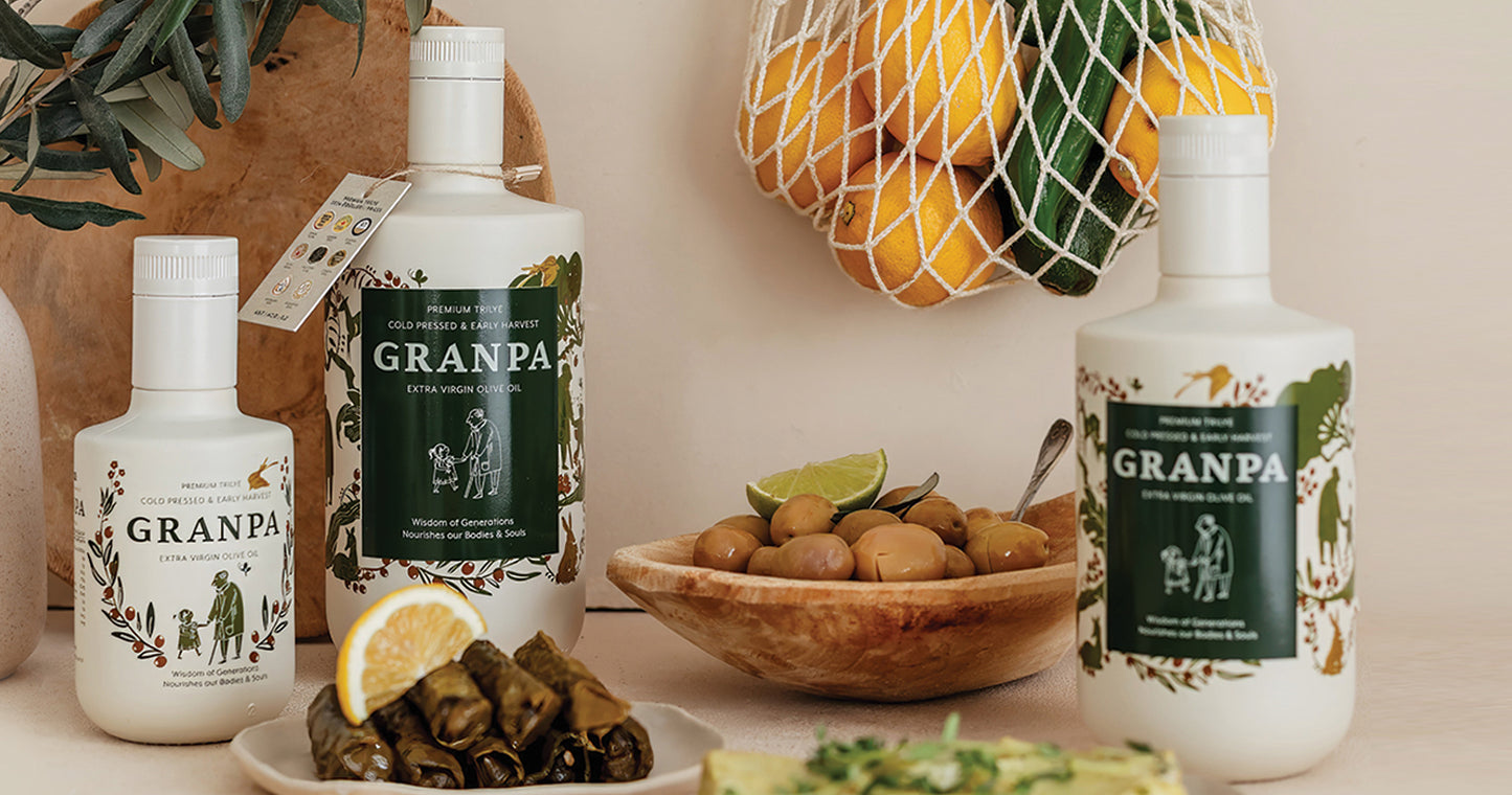 Granpa Premium Koleksiyon natürel sızma zeytinyağı şişeleri ve zeytin sunumu – erken hasat, soğuk sıkım özel seri